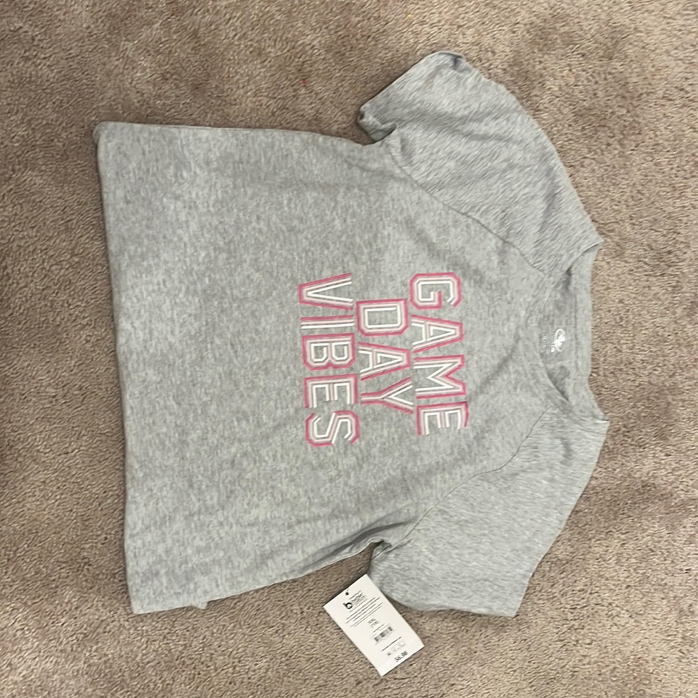 A matching set from Walmart colors, white and gray pink and and size 10/12